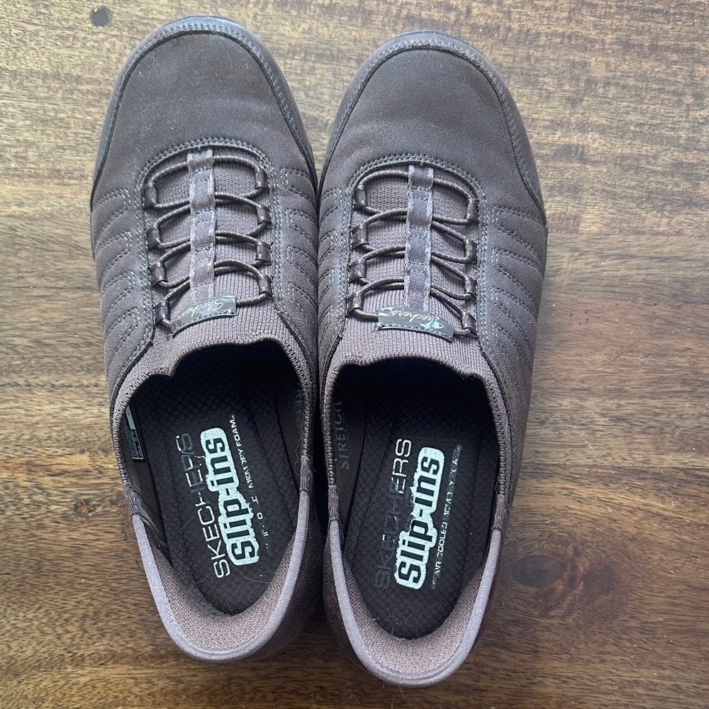 Skechers women’s Slip-On Sneakers in Dark Brown